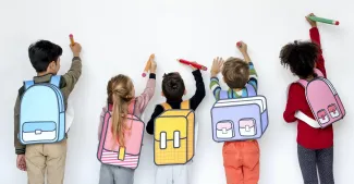 A group of children smiling and holding colorful backpacks, ready for school or an outdoor adventure.
